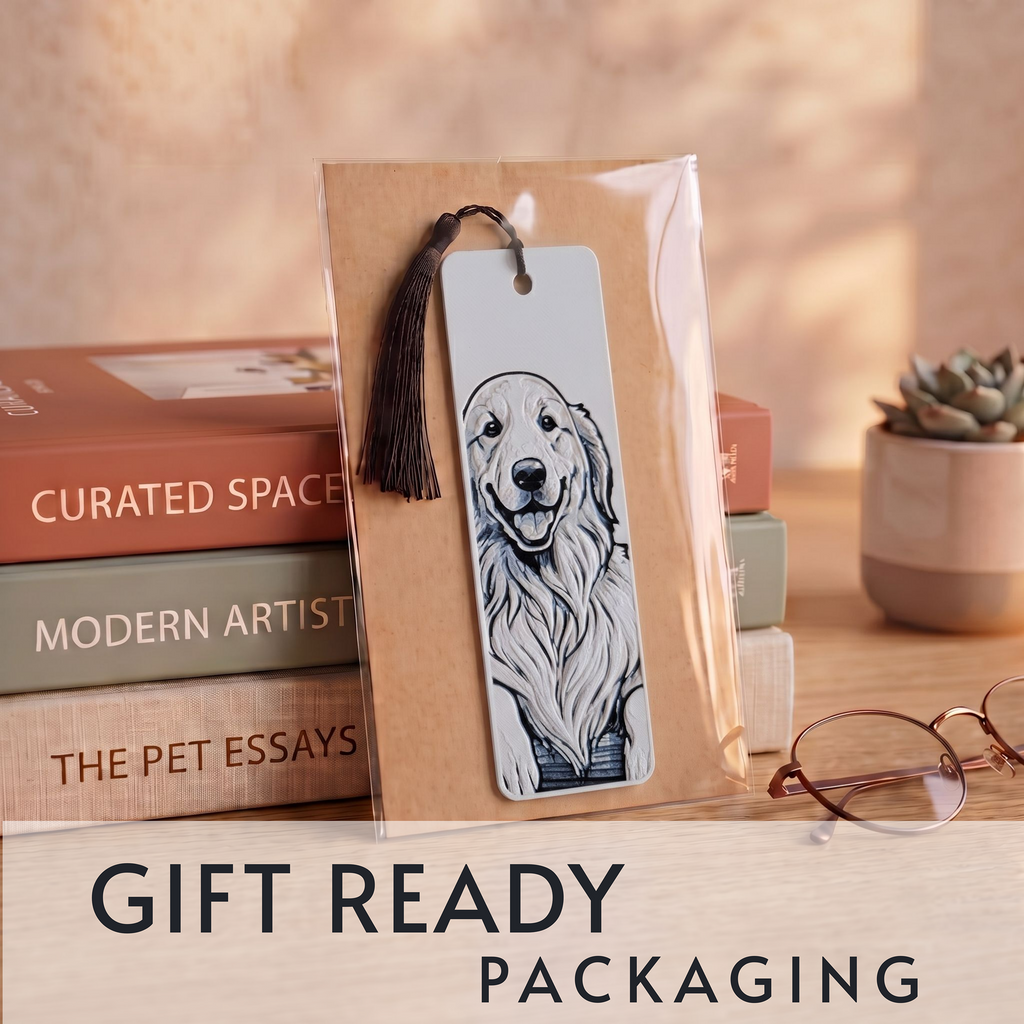 A packaged bookmark featuring a black-and-white illustration of a golden retriever dog, displayed upright on stacked books with a tassel. The scene includes warm sunlight, a small potted succulent, eyeglasses, and the text 'GIFT READY PACKAGING' at the bottom.