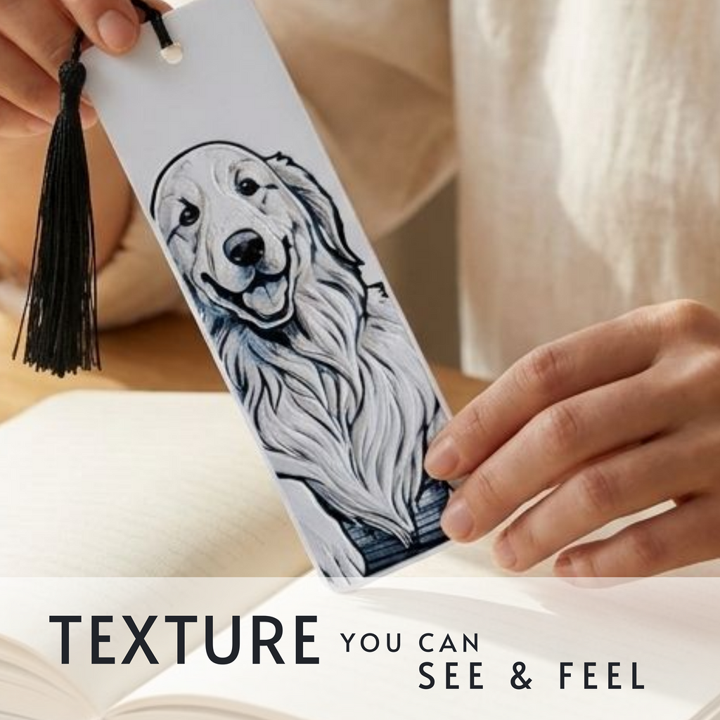 A white bookmark with a black line art illustration of a golden retriever dog and a black tassel, held by hands over an open book. Text overlay at the bottom reads 'TEXTURE YOU CAN SEE & FEEL'.