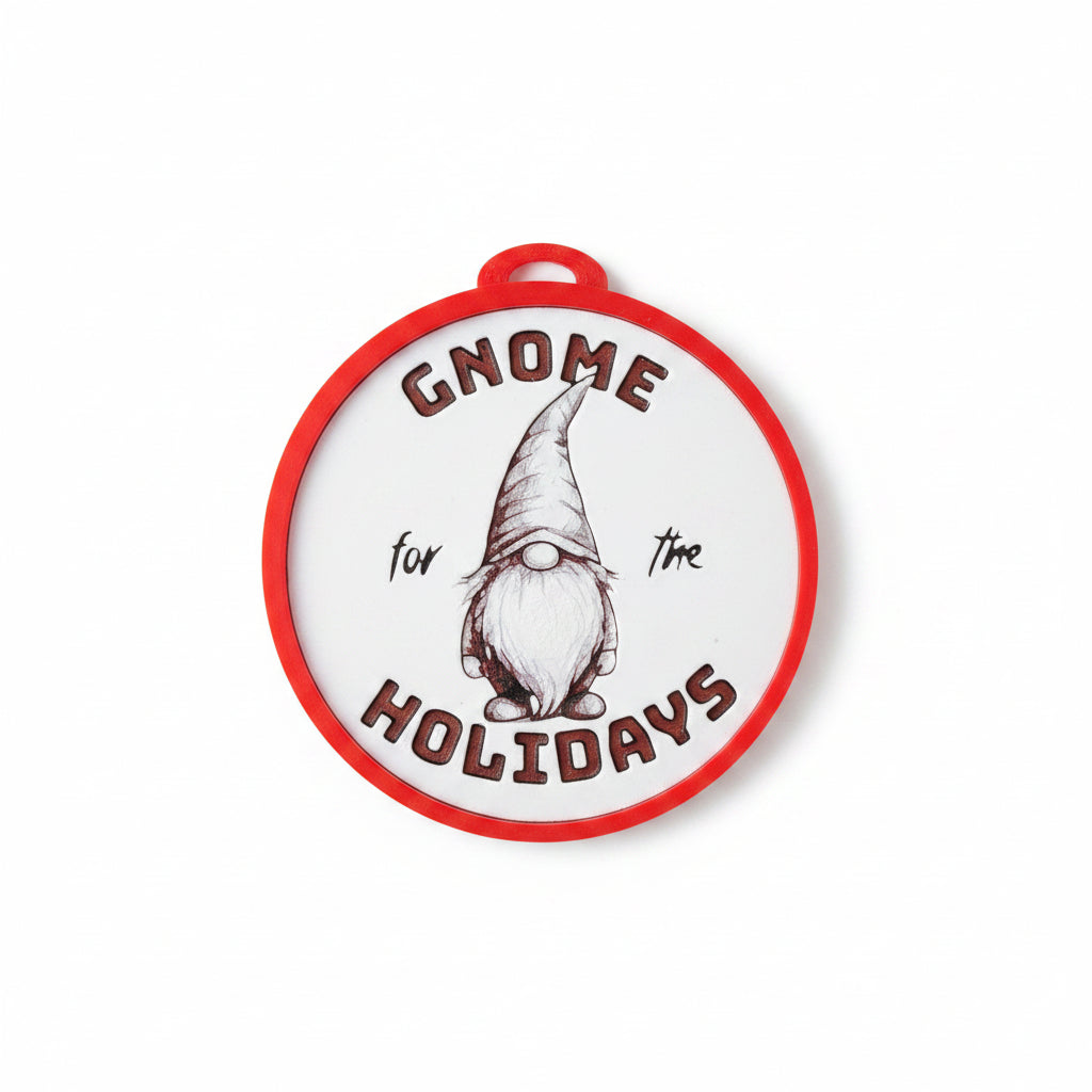 A round white holiday ornament with a red border and a central illustration of a gnome, featuring the text 'GNOME for HOLIDAYS' on a white background.