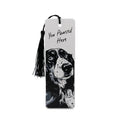 A rectangular 3D printed bookmark featuring a black and white illustration of a dog and the text 'You Pawsed Here', complete with a black tassel, shown on a clean white background.